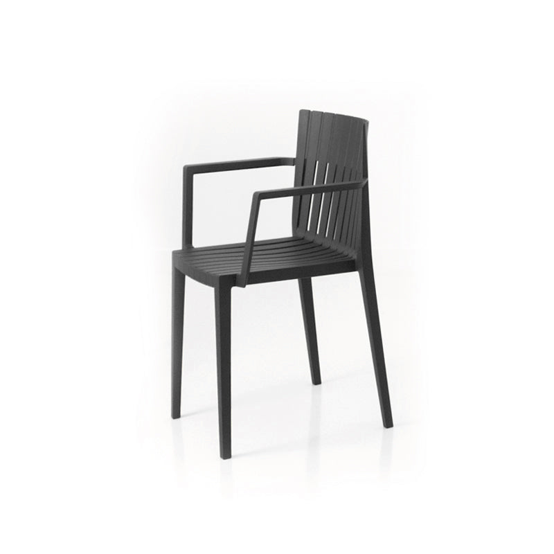 Black Spritz chair with arms by Archirivolto Design for Vondom, luxury dining chair in reclaimed elegance made from Mediterranean recycled plastic – Modern Coastal Living.| Black