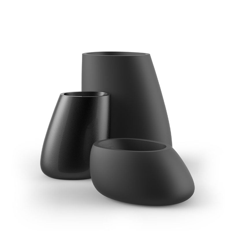 Stone planter collection in black by Vondom, sustainable modern planters for indoor and outdoor spaces – Modern Coastal Living.